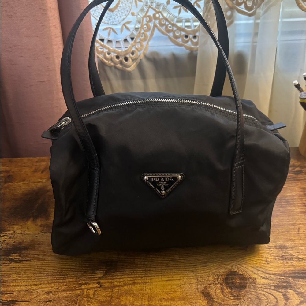 Prada Black Shoulder Bag with Dome Shape and Metal Logo